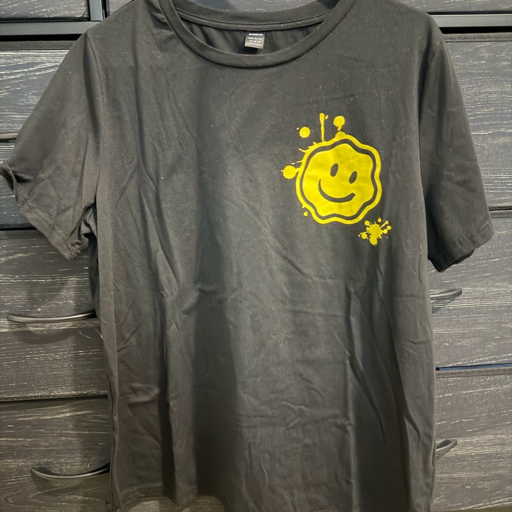 Black T-Shirt with Yellow Smiley Design